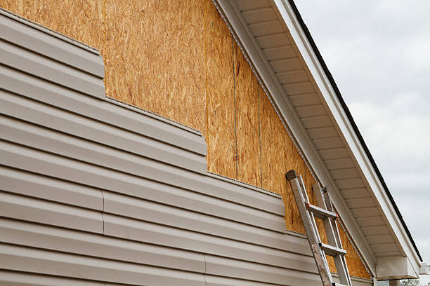 Professional Vinyl Siding technician working in Youngwood, PA